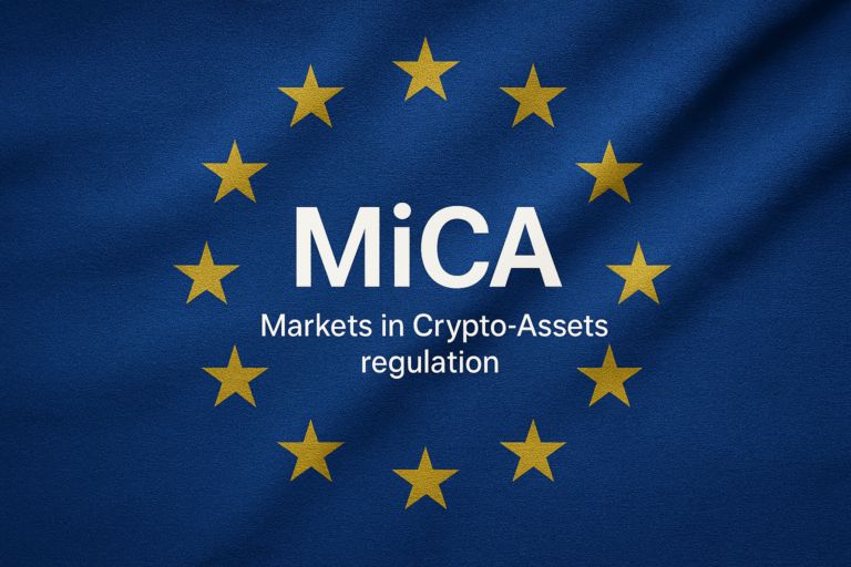 EU flag with gold stars encircling the text: MiCA – Markets in Crypto-Assets regulation in the center of the circle of stars